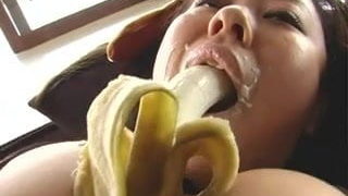Big tits asian sucking a banana