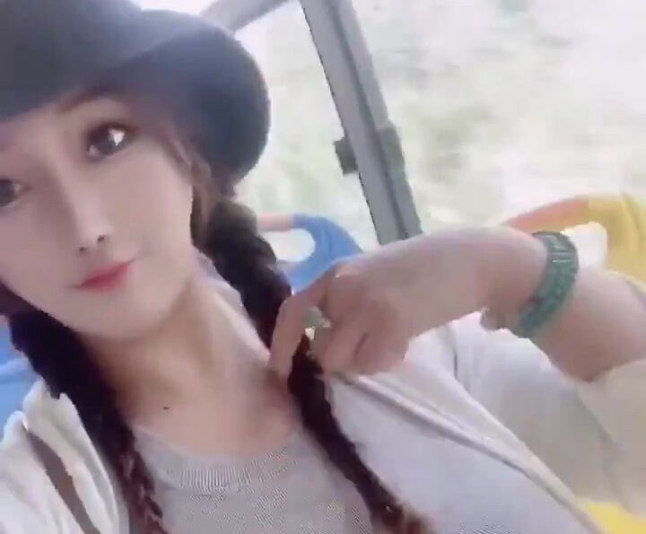 Maomixiner wearing a tight gray shirt